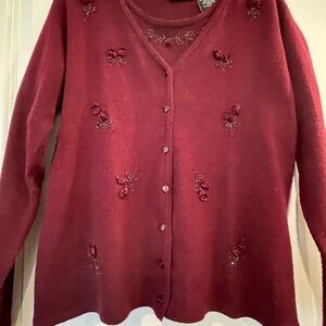 Burgundy two-piece sweater set. Beaded decorative flowers